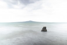 Rangitoto on dusk at Takapuna Beach, Takapuna, Auckland, New Zealand.