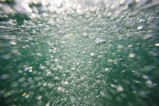 Champagne water on dusk during a small summer swell at Blackhead, Dunedin, New Zealand. 