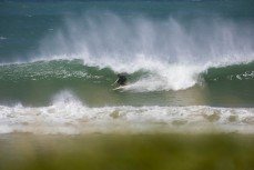 Reuben Lyons pulls into a clean barrel at a remote beach in the Catlins, New Zealand.Credit: www.nzsurfjournal.com/Derek Morrison