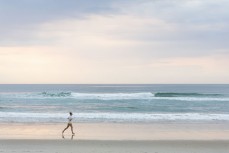 Beach runner at St Clair, Dunedin, New Zealand.Credit: www.boxoflight.com/Derek Morrison
