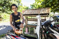 Wayan filling up the Harley at Uluwatu, Bali, Indonesia.