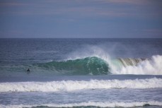 A set rolls through the outer bank during a new swell at a beach near Dunedin, New Zealand.
Credit: www.boxoflight.com/Derek Morrison