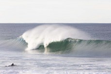A surfer paddles into clean waves at St Clair, Dunedin, New Zealand.
Credit: www.boxoflight.com/Derek Morrison