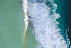 Waves break near the Rangitata Rivermouth, Canterbury, New Zealand.