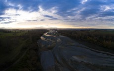 Sunset over the Ashburton River, Canterbury, New Zealand.