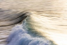 A small winter swell at Aramoana, Dunedin, New Zealand. 