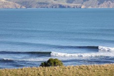 Surfers make the most of offshore conditions on the north coast of Dunedin, New Zealand.Credit: www.boxoflight.com/Derek Morrison