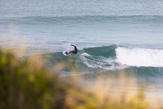Damian Phillips wraps around on a fun wave at Blackhead Beach, Dunedin, New Zealand.
Credit: www.boxoflight.com/Derek Morrison