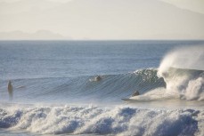Surfers make the most of offshore conditions on the north coast of Dunedin, New Zealand.Credit: www.boxoflight.com/Derek Morrison