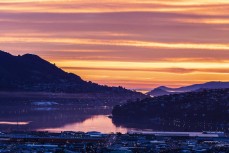 Dawn over Otago Harbour, Dunedin, New Zealand.Credit: www.boxoflight.com/Derek Morrison