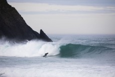 Lloyd McGinty on a solid winter east swell at Blackhead, Dunedin, New Zealand.