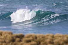 A big southeast swell hits the beaches of the Otago Peninsula, Dunedin, New Zealand.