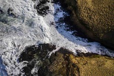 A big southeast swell hits the beaches of the Otago Peninsula, Dunedin, New Zealand.