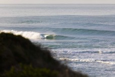 Fun winter waves at St Kilda, Dunedin, New Zealand.