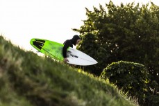 Nick Mills makes the most of fun winter waves at St Kilda, Dunedin, New Zealand.