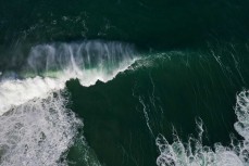 A big southeast swell hits the beaches of the Otago Peninsula, Dunedin, New Zealand.