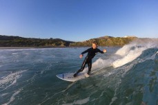 Luke Rogers lines up a section at Blackhead Beach, Dunedin, New Zealand.