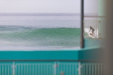 Dane Robertson behind the pool fence during a small swell at St Clair, Dunedin, New Zealand.