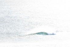 Playful summer wave at Blackhead Beach, Dunedin, New Zealand.