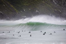 Surfers make the most of a storm swell at a remote beach break in the Catlins, New Zealand.Credit: www.boxoflight.com/Derek Morrison