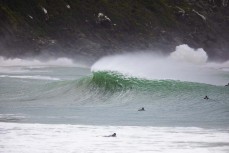 Surfers make the most of a storm swell at a remote beach break in the Catlins, New Zealand.Credit: www.boxoflight.com/Derek Morrison