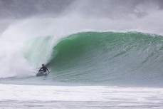 Elliot Paerata-Reid drives off the bottom during a storm swell at a remote beach break in the Catlins, New Zealand.Credit: www.boxoflight.com/Derek Morrison