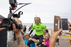 Open Women's Winner Ava Henderson, of Christchurch, is chaired up the beach after the Health 2000 2020 New Zealand Surfing Championships held at St Clair, Dunedin, New Zealand.