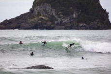 Anika Ayson picks off a wave at Tauranga Bay, Westport, West Coast, New Zealand.