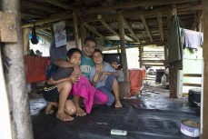 Pa'a with his children near Boulders, Samoa. 