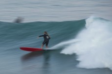 Homa Mattingly rides a waves at dusk at St Clair Point as a swell pulses into St Clair, Dunedin, New Zealand.
Credit: www.boxoflight.com/Derek Morrison