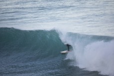 Dane Robertson catches a wave at dusk at St Clair, Dunedin, New Zealand.
Credit: www.boxoflight.com/Derek Morrison