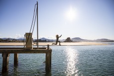 Keo Morrison, 10, jumps off the wharf at Karitane, Dunedin, New Zealand.Credit: www.boxoflight.com/Derek Morrison