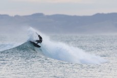 A surfer belts the lip during a small winter swell at Blackhead, Dunedin, New Zealand.Credit: www.boxoflight.com/Derek Morrison