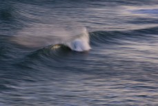 Peak after dark during a small winter swell at Blackhead, Dunedin, New Zealand.Credit: www.boxoflight.com/Derek Morrison