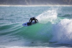 Brett Summerlee surfs on rail as a fun swell wraps into the North Coast, Dunedin, New Zealand.
Credit: www.boxoflight.com/Derek Morrison