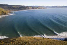 A fun swell wraps into the North Coast, Dunedin, New Zealand.Credit: www.boxoflight.com/Derek Morrison