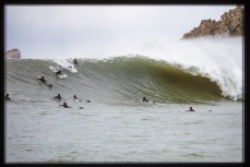 The pack of chargers during a solid ground swell at Karitane Reef, Dunedin, New Zealand. 1999
Credit: www.boxoflight.com/Derek Morrison