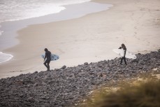 Mates Keo Morrison (11) and Jack Higgins head out for a surf in cold winter waves at Blackhead, Dunedin, New Zealand.
Credit: www.boxoflight.com/Derek Morrison