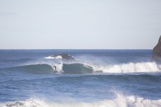 A surfer rides a wave during a new swell at St Clair, Dunedin, New Zealand.
Credit: www.boxoflight.com/Derek Morrison