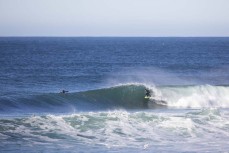 A surfer rides a wave during a new swell at St Clair, Dunedin, New Zealand.
Credit: www.boxoflight.com/Derek Morrison