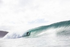 A surfer gets barrelled at Aramoana, Dunedin, New Zealand.