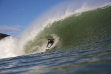 Leon Santorik makes the most of a spring swell hits The Ledge at Manu Bay, Raglan, Waikato, New Zealand.