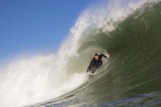 Leon Santorik makes the most of a spring swell hits The Ledge at Manu Bay, Raglan, Waikato, New Zealand.