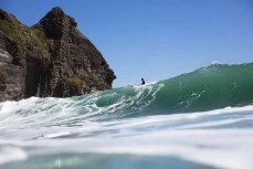 Leia Millar (13) lets a set go through at The Bar at Piha, Auckland, New Zealand.