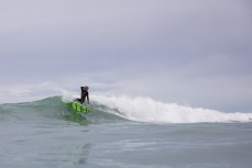 Koby Cameron makes the most of waves at a surf break near Kaikoura, New Zealand. Photo: Derek Morrison