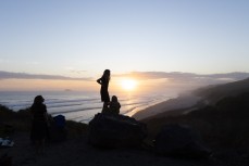 Groms enjoying the dusk light at Blackhead Beach, Dunedin, New Zealand.Credit: www.boxoflight.com/Derek Morrison