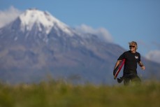 Clive Neeson looks for a wave near Oakura, New Plymouth, Taranaki, New Zealand.