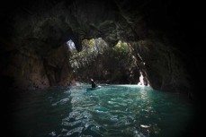 Keo Morrison explores the coastline at Whangamata, Coromandel, New Zealand.