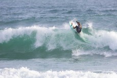 Anna Brock surf training at dawn at Mount Maunganui, Bay of Plenty, New Zealand. Photo: Derek Morrison