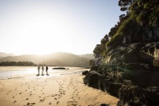 Summer at Totaranui in Abel Tasman National Park on a stunning day on the water, Tasman, New Zealand.